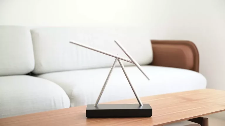 Swinging Sticks Kinetic Sculpture Fuses Art And Horology